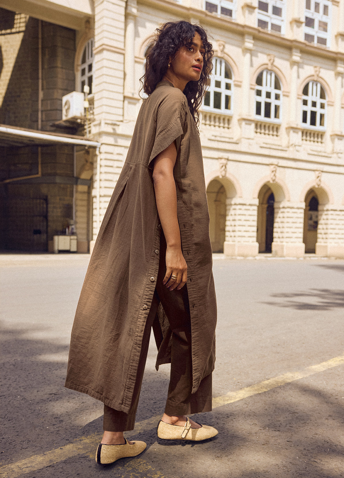 Bark Buttoned Shirt Kaftan, Woven Fabric - No Nasties Organic Cotton Made In India, worn open over cropped trousers, side-back view